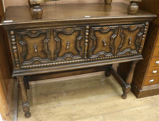 A Jacobean oak side cabinet, W.107cm